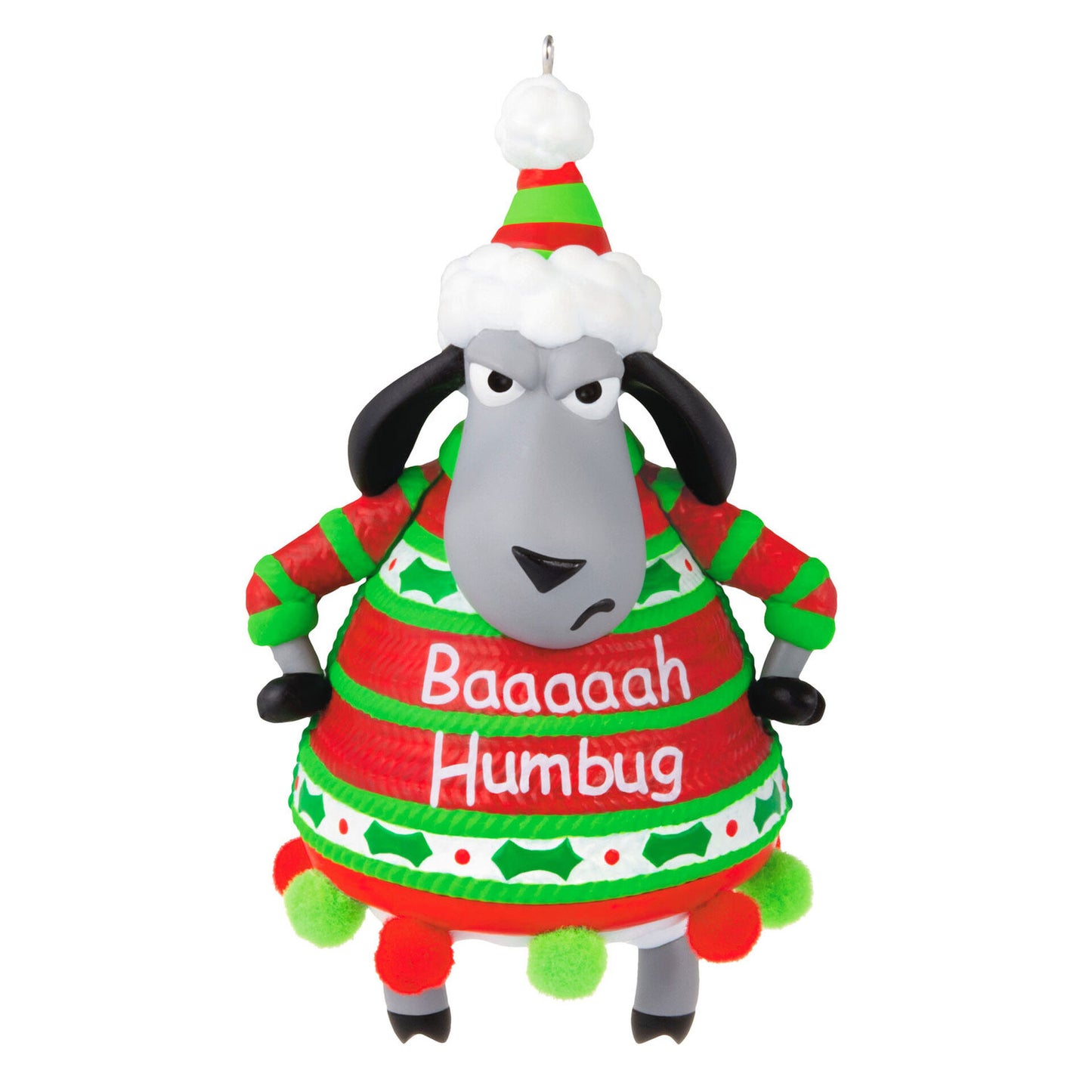 Christmas ornament of a grey sheep looking grumpy wearing a green and red hat and a green and red sweater that reads "Baaaaah Humbug" and is adorned with red and green puff balls along the bottom.
