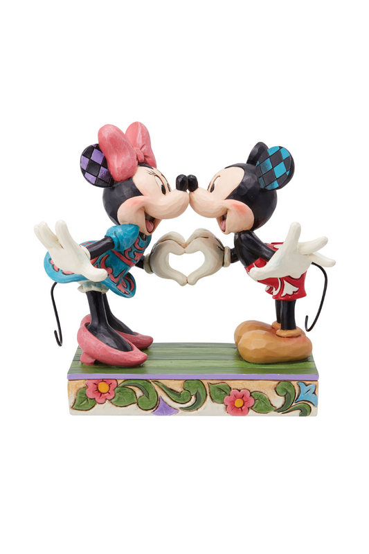 A figure of Mickey and Minnie with noses together making a heart shape with their hands.