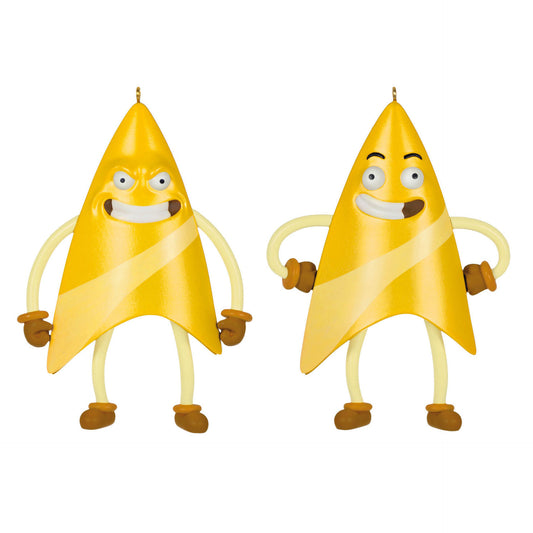 Two ornaments, each depicting a gold Star Trek badge with arms, legs, and a face. One has a determined face and one has a silly face. 