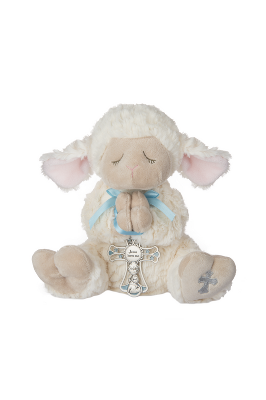 Praying white lamb plush holding silver and blue cross. 