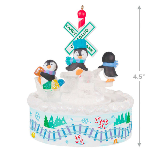 Lavender Playful Penguins on Train Musical Ornament With Light and Motion